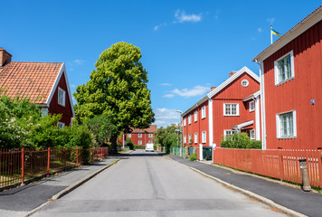 Vintage residential buildings in Red Town at the Marielund district of Norrkoping, Sweden. Red Town celebrates its centenary in 2018.