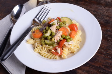 Fusilli pasta dish with organic seasoning 