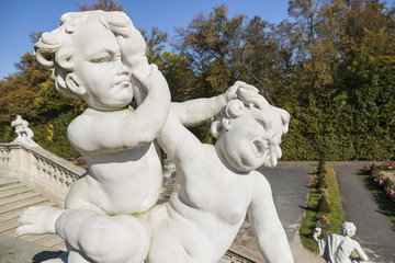 Beautiful palace Wilanow in Warsaw. Capital of Poland. Sculptures in garden.
