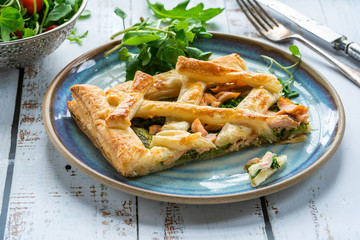 Salmon and broccoli tart with fresh leaf salad