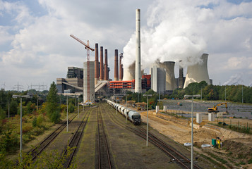 Obraz premium Power Plant And Railroad Tracks