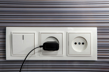 socket with recharging device