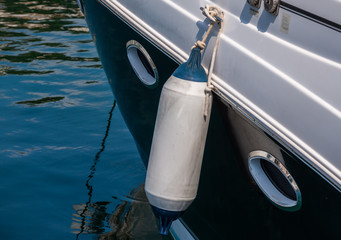 buoy hanging outside the hull of the boat, boat equipment