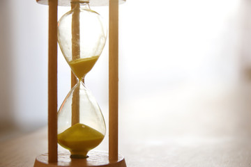 Hourglass as time passing concept for business deadline.