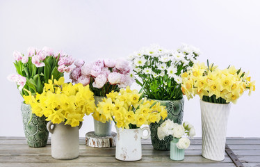 Flower shop with daffodils, peonies, daisies and other plants.