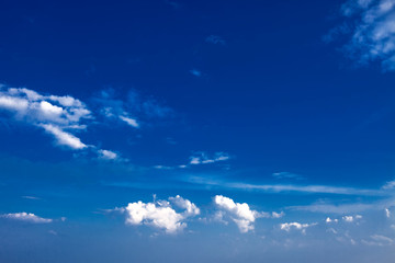 Naklejka na ściany i meble Beautiful clouds with blue sky background. Nature weather, cloud blue sky and sun