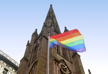 A rainbow flag on front of Trinity Church in New York.