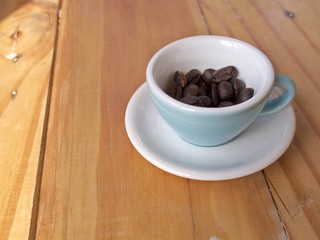 Cooffee seed and cup in coffee shop