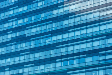 blue background of office building windows