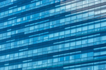 blue background of office building windows