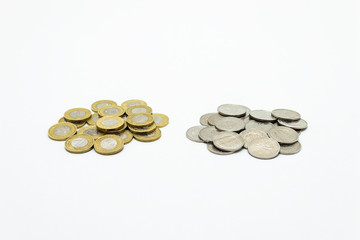 A pile of coins, the Polish currency 1 and 2  PLN / Polish zloty. Isolated on white background with clipping path.