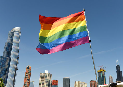 A rainbow flag with Chicago cityscape, USA