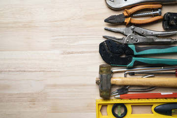 Old tools equipment on wood table background, engineering concept