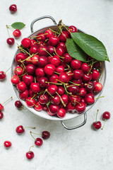 Harvested Cherries in a colander topview