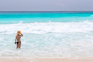 The beach with waves on the Seychelles