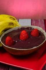 Healthy vegan dessert with banana, avocado and strawberry