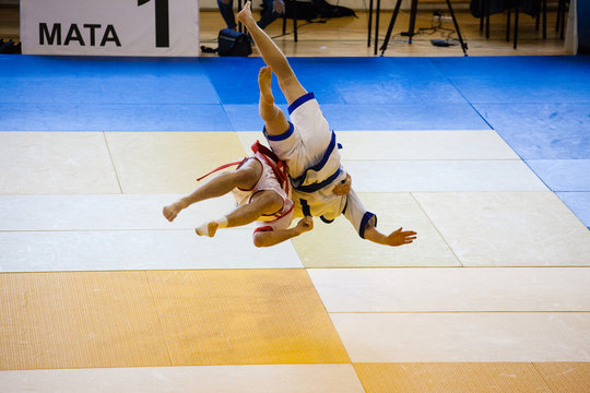Fight of two athletes Asian Kuresh fight on the mat