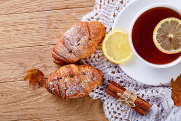 white cup of tea with cookies on a wooden background white cup of tea with cookies on a wooden background. copy space.