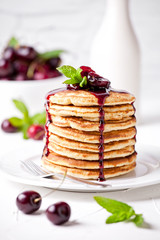 Stack Of Pancakes With Cherry Topping