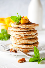 Homemade Pancakes With Peach And Nuts