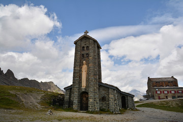 Fototapeta premium Stone church at Col de l'Iseran mountain pass in France, the highest paved pass in the Alps,part of the Graian Alps, in the department of Savoie.