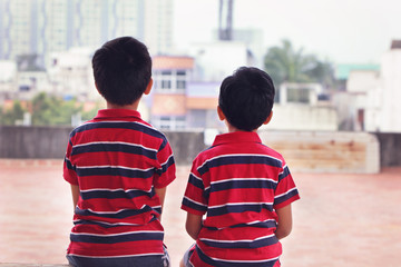 Indian Little Brothers Looking Somewhere