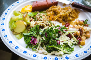 picnic cardboard with a variety of healthy salads