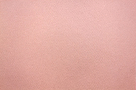 Background from powder pink clean handmade paper
