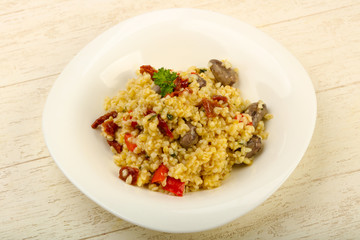 Bulgur with chicken hearts