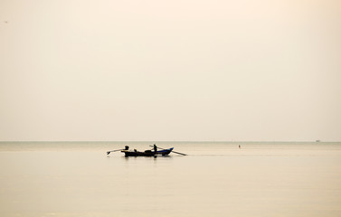Fishing boats fishing off the morning thuen stomach morning sunrise in the sea Songkhla Thailand