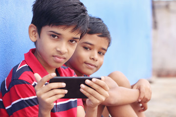     Indian Little Brothers with MobilePhone