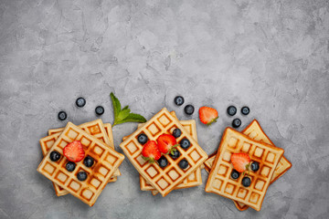 belgian waffles with strawberries and blueberries