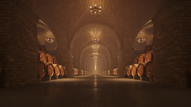 Oak Barrels stacked In a dark Wine Cellar or basement. Traditional winery.