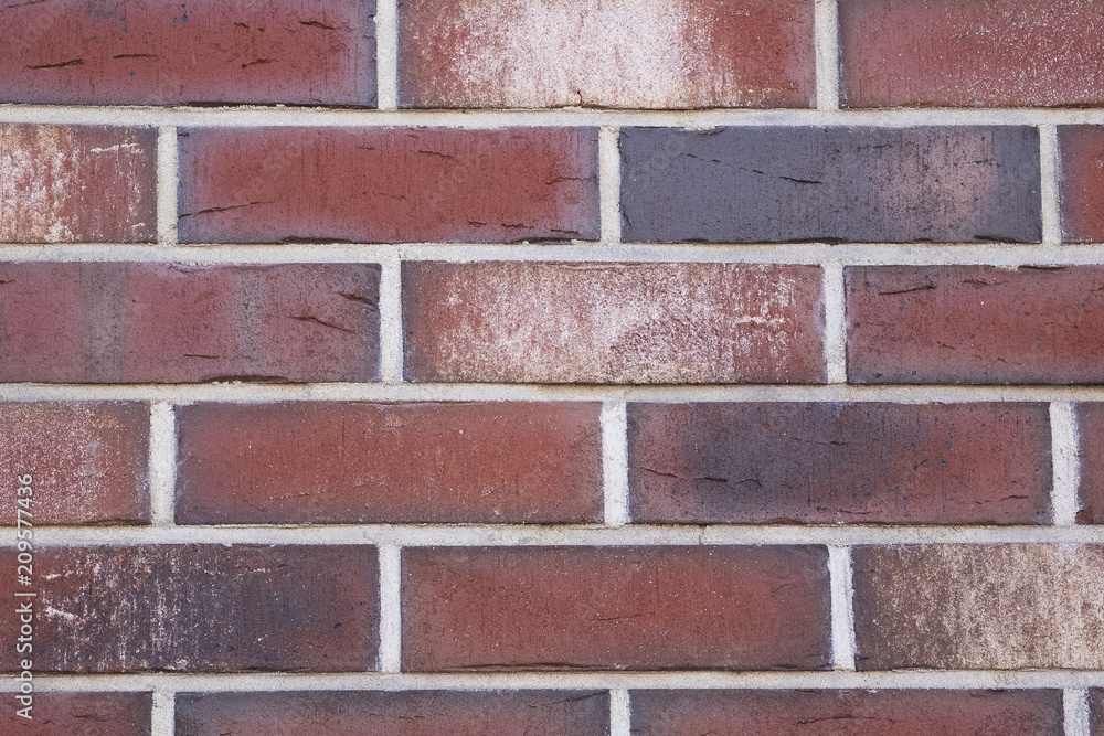 Wall mural brick wall of red color. urban background.