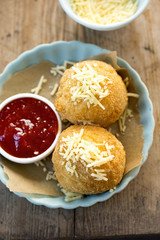 Cheddar cheese bombs with pasta filling & chilli jam