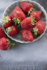 Strawberries in blue bowl 