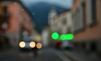Blurred abstract background. Travelling in Italy in a rainy summer night.