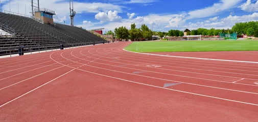 Foto op Plexiglas Red track at stadium © Sage Photography 