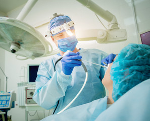 Endoscopic sinus surgery. Laser vaporization of nasal concha - obrazy, fototapety, plakaty