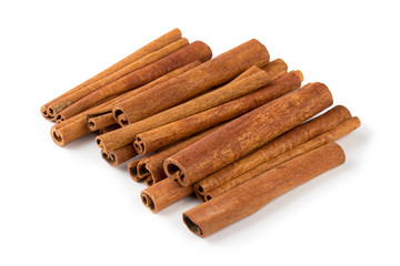 cinnamon sticks top view isolated on white background