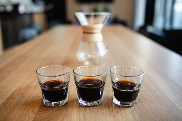 Hot coffee on wooden table.