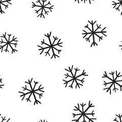 Obraz premium Hand drawn snowflake icon seamless pattern background. Business concept vector illustration. Handdrawn winter christmas symbol pattern.