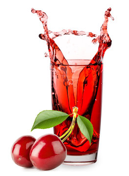 Glass Of Cherry Juice With Splash And Berries