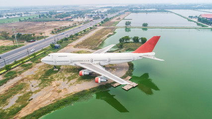 Abandoned aircraft in the reservoir area.Aerial view and top view.