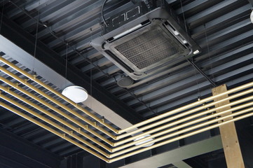 golden tubes, air conditioning and fixtures, on the ceiling