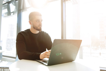 business man working with documents and laptop