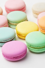 Fototapeta na wymiar Macarons. Colorful French Macaroons Close Up