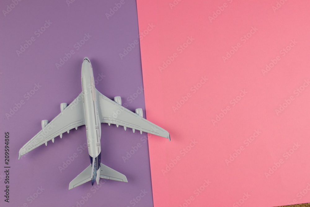 Poster travel concept with plane on color paper background. copy space for text and design
