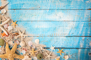 Summer traveling time. Sea holiday background with various shells.