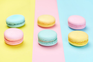 Fototapeta na wymiar Macaron Sweets On Pastel Background